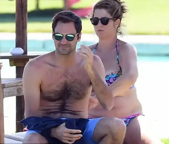 Roger Federer Relaxes with His Wife Mirka on the Beach