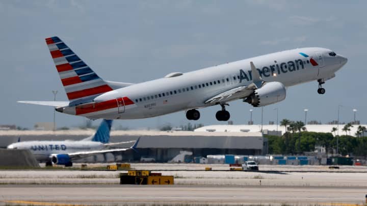 American Airlines raises profit forecast thanks to stronger demand and cheaper fuel