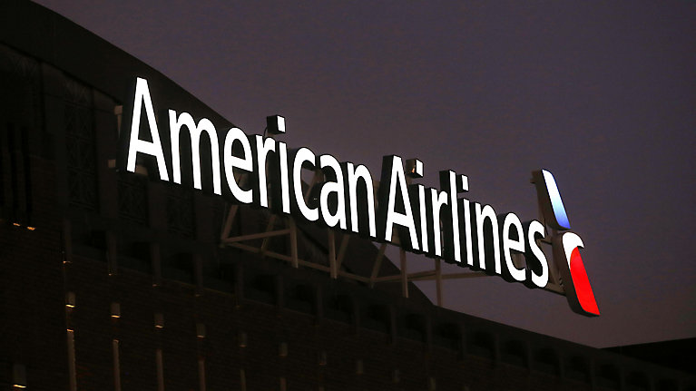 American Airlines is raising bag fees and changing how customers earn frequent-flyer points