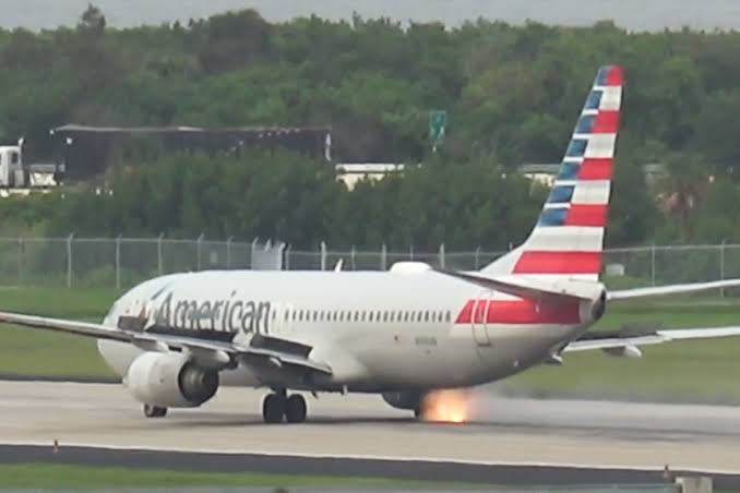 Scary moment American Airlines tire erupts in fiery explosion during takeoff