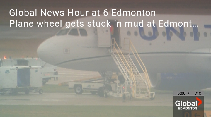 Plane wheel gets stuck in mud at Edmonton International Airport